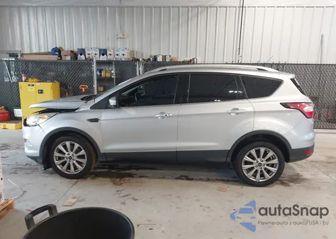2017 Ford Escape Titanium z USA, uszkodzony, nr VIN 1FMCU9JD3HUD37432